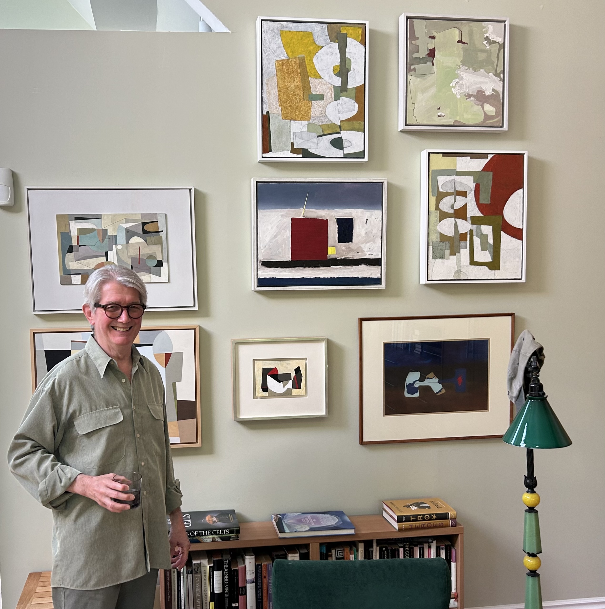 Ed Nemeth and a wall of abstract works