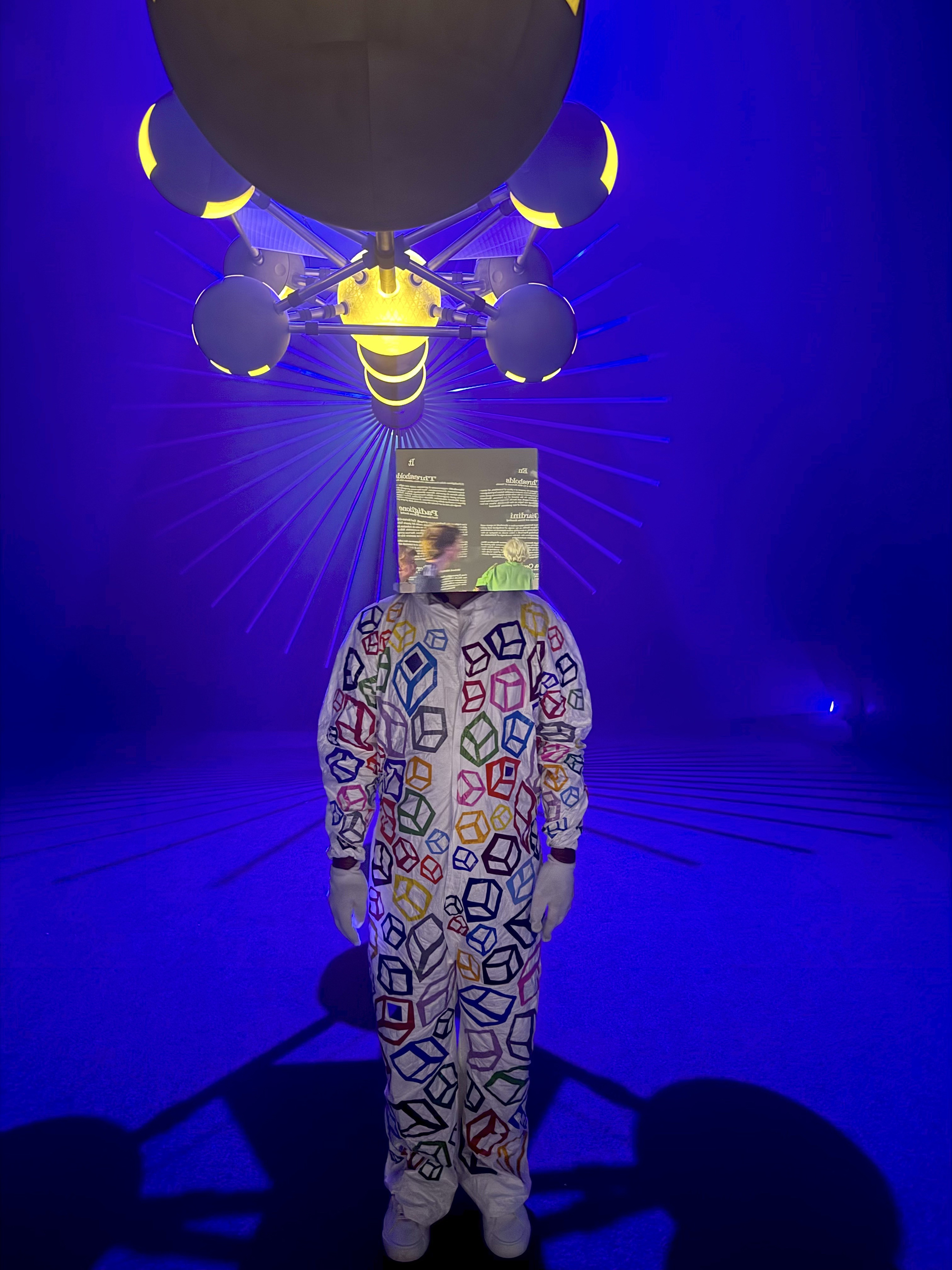 Image 1: Kube Man Performance, Acrylic Mirror Helmet, white vestments, shoes, and gloves, German Pavillion, Venice Biennale 2024