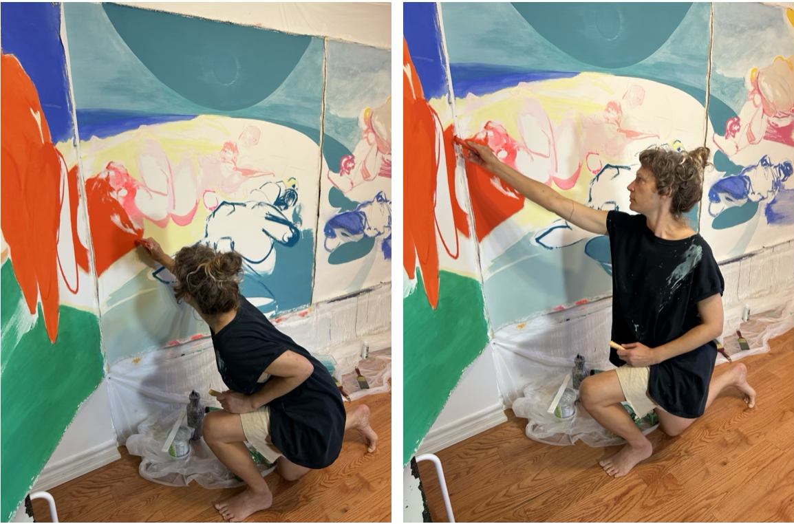 Katie Pretti sitting in her studio with a powerful work currently still in production behind her