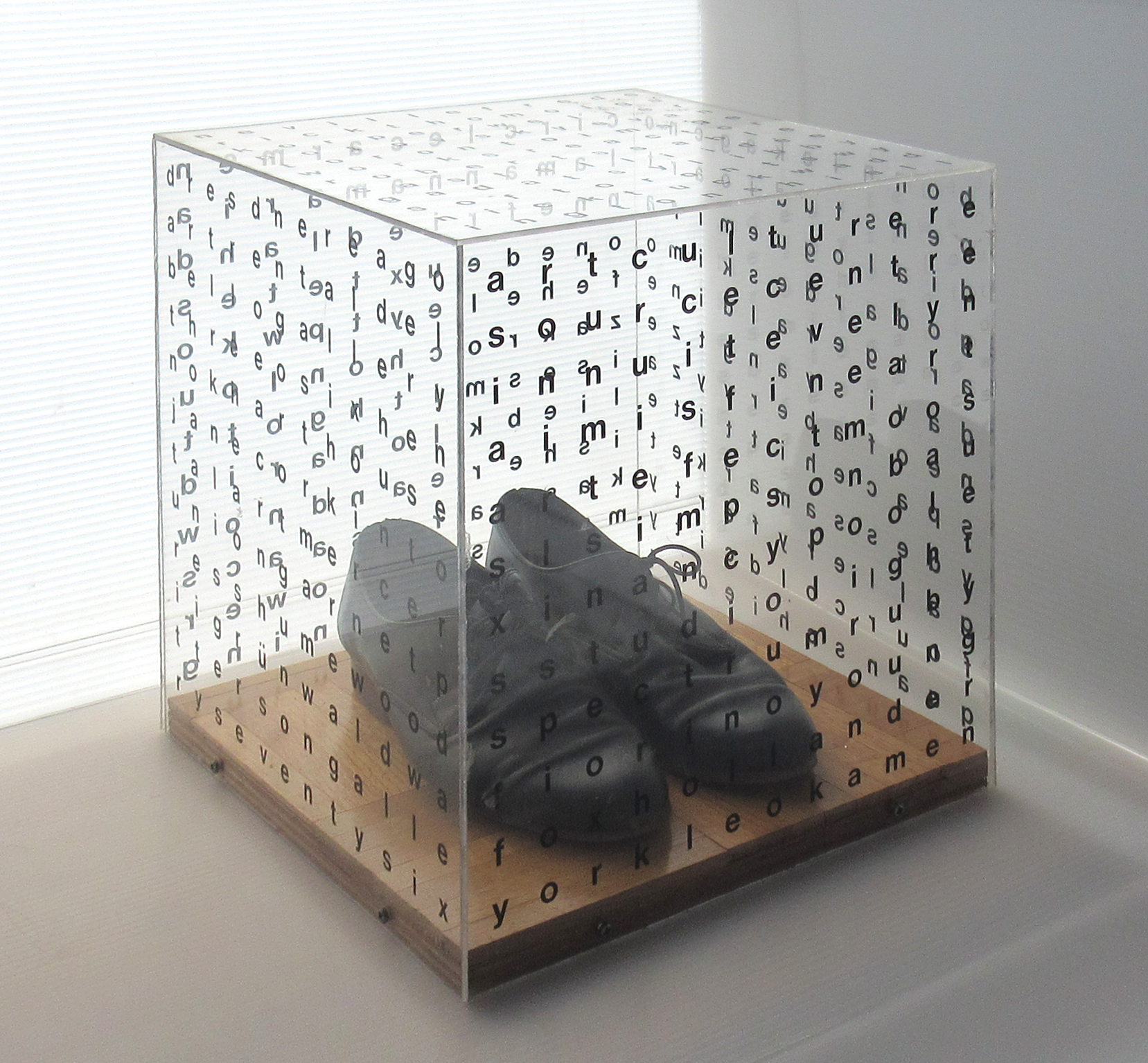 Gallery Space (Shoes), 1988, acrylic, wood floor, shoes, 14 x 14 x 15 inches. Courtesy of the artist